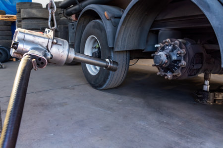 Compressed air tool to remove wheel bolts in a tire shop.の写真素材