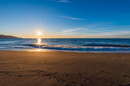 Poniente beach in Motril at dawn, on the tropical coast of Granada.の写真素材