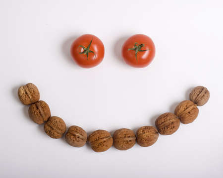 Tomatoes and walnuts  smiley face