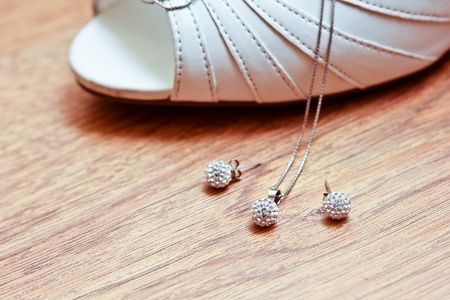 Bride s earrings and shoesの写真素材
