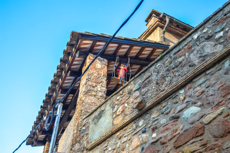 The shit heard Nadal's uncle. The Uncle of Mura. Catalan Christmas tradition consisting of asking for gifts from a wooden log. Mura, Spain - December 29 2019のeditorial素材