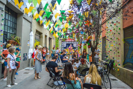 Fiesta Major de Gracia, Carrer Ciudad Real, Barcelona, Spain - August 2019. Decorated streets of...