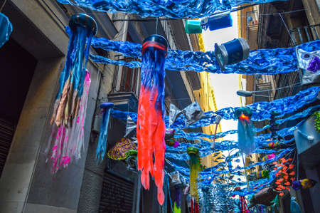 Fiesta Major de Gracia, Carrer de Jesus, Barcelona, Spain - August 2019. Decorated streets of Gracia districtのeditorial素材