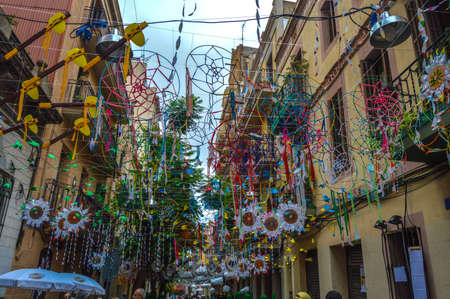 Fiesta Major de Gracia, Carrer Joan Blanques de baix, Barcelona, Spain - August 2019. Decorated streets of Gracia districtのeditorial素材
