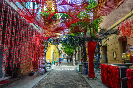 Fiesta Major de Gracia, Carrer Joan Blanques de baix de tot, Barcelona, Spain - August 2019. Decorated streets of Gracia districtのeditorial素材