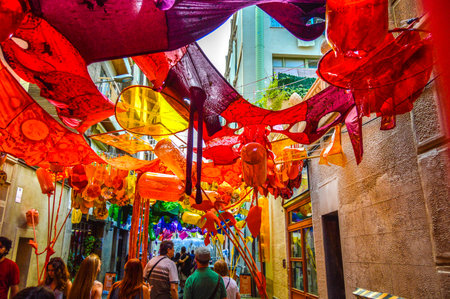 Fiesta Major de Gracia, Carrer La Perla, Barcelona, Spain - August 2019. Decorated streets of Gracia districtのeditorial素材