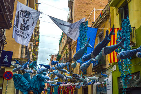 Fiesta Major de Gracia, Carrer Llibertat, Barcelona, Spain - August 2019. Decorated streets of Gracia districtのeditorial素材