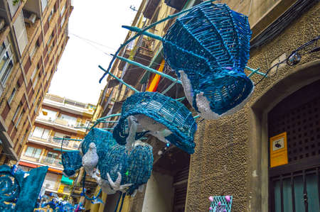Fiesta Major de Gracia, Carrer Llibertat, Barcelona, Spain - August 2019. Decorated streets of...