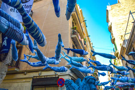 Fiesta Major de Gracia, Carrer Llibertat, Barcelona, Spain - August 2019. Decorated streets of Gracia districtのeditorial素材