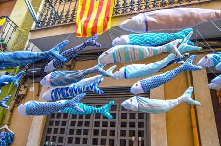 Fiesta Major de Gracia, Carrer Llibertat, Barcelona, Spain - August 2019. Decorated streets of...