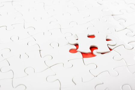 Missing jigsaw puzzle pieces. Business concept. Compliting final puzzle taskの写真素材
