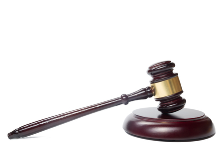 Law concept - Wooden judges gavel isolated on white background.の写真素材