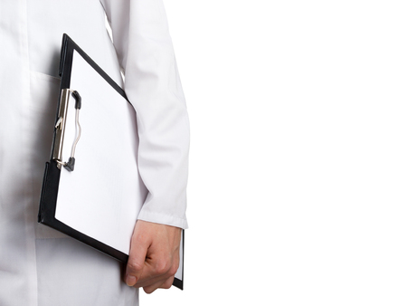Female doctor's hand holding medical clipboard with blank sheet of paper and stethoscope isolated on white background. Concept of Healthcare And Medicine. Copy spaceの写真素材