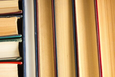 Top view of old used colorful hardback books. Back to schoolの写真素材