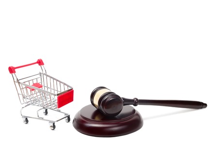 Judge gavel and shopping cart isolated on white background. Auction conceptの写真素材