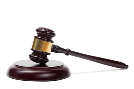 Law concept - Wooden judges gavel isolated on white background.の写真素材