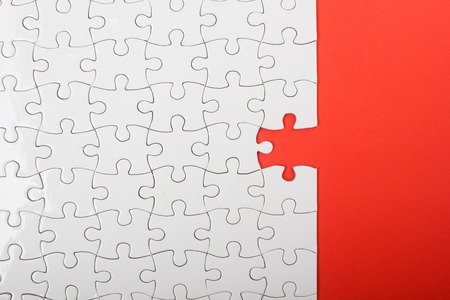Missing jigsaw puzzle pieces. Business concept. Compliting final puzzle taskの写真素材
