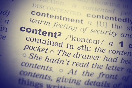 Close up of English dictionary page with word Content.の写真素材