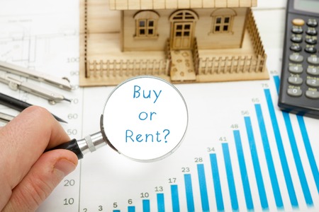 Magnifying glass with  text Buy or Rent in a concept image.の写真素材