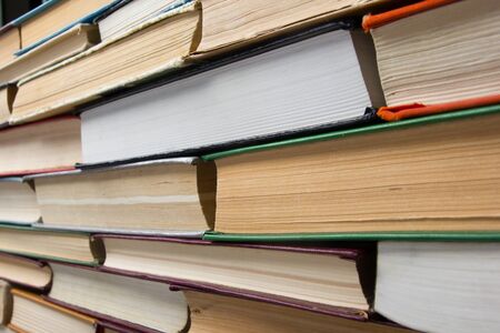 Top view of old used colorful hardback books. Back to schoolの写真素材