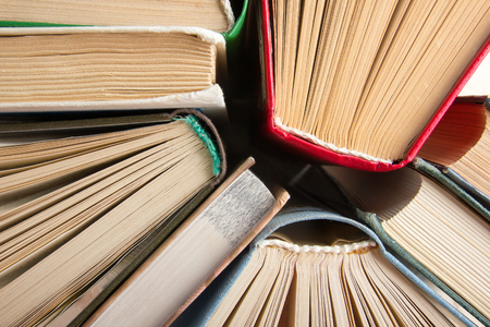 Top view of old used colorful hardback books. Back to schoolの写真素材