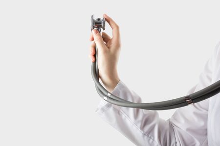 Female doctor and stethoscope isolated on white background. Concept of Healthcare And Medicine. Copy space for textの写真素材