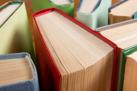 Top view of old used colorful hardback books. Back to schoolの写真素材
