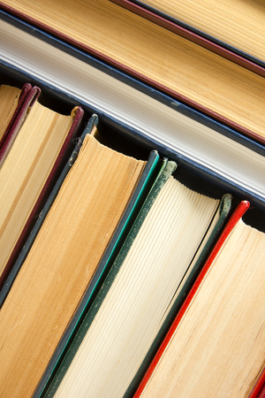 Top view of old used colorful hardback books. Back to schoolの写真素材