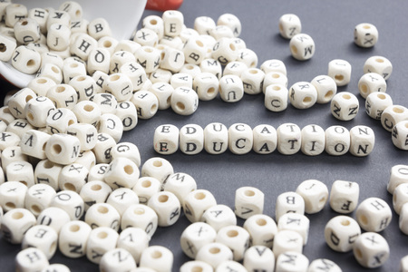 Word Education on wooden cubes or blocks - educational background. Wood ABC.の写真素材