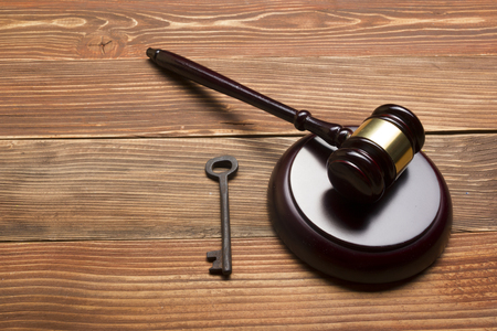 Judges Or Auctioneer Gavel, Retro Door Key On The Wood Table. Concept For Trial, Bankruptcy, Tax, Mortgage,  Auction Bidding, Foreclosure Or Inherit Real Estate.の写真素材