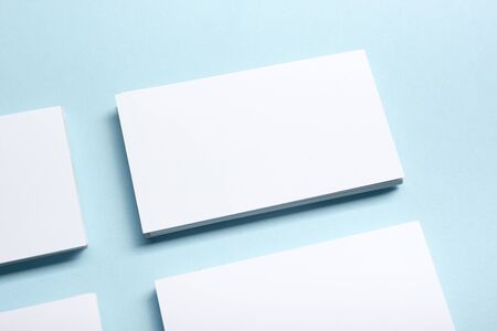 Business card blank over office table. Corporate stationery branding mock-up.