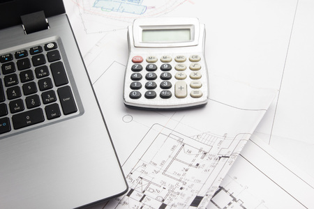 Workplace of architect - Architectural project, blueprints, rolls and tablet, pen, divider compass...