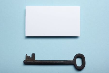 Business card blank over office table. Corporate stationery branding mock-up.の写真素材