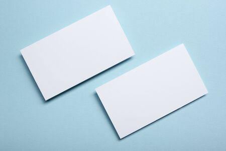 Business card blank over office table. Corporate stationery branding mock-up.の写真素材