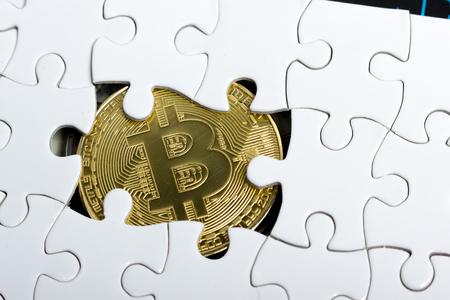 golden bitcoin coin. cryptocurrency. Missing jigsaw puzzle pieces. Business concept. Compliting final taskの写真素材