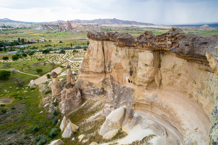 Love valley in Goreme village, Turkey. Rural Cappadocia landscape. Stone houses in Goreme, Cappadocia. Countryside lifestyle.の写真素材