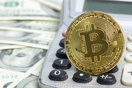 Bitcoin golden coin New virtual money and dollar background . Cryptocurrency. Business and Trading concept. Close-up shotの写真素材