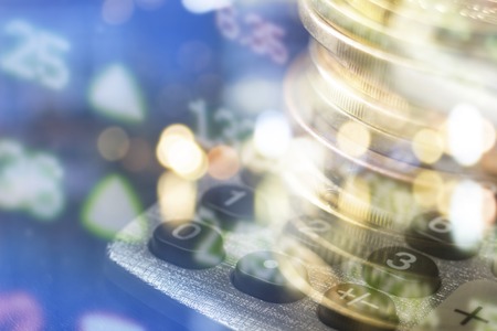 Finance, banking concept. Euro coins, us dollar banknote close-up. Abstract image of Financial system with selective focus, toned, double exposure.の写真素材