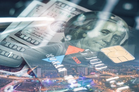 Finance, banking concept. Euro coins, us dollar banknote close-up. Abstract image of Financial system with selective focus, toned, double exposure.の写真素材