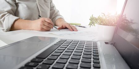 Architects working on blueprint, real estate project. Architect workplace - architectural project,...