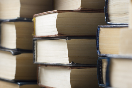 Stack of books background. many books piles.の写真素材