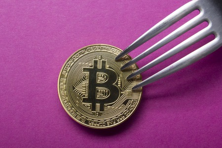 Bitcoin golden coin New virtual money and dollar background . Cryptocurrency. Business and Trading concept. Close-up shotの写真素材