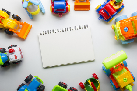 Kids educational developing toys frame on white background. Top view. Flat lay. Copy space for textの写真素材