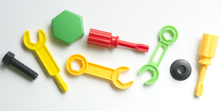 Kids educational developing toys frame on white background. Top view. Flat lay. Copy space for textの写真素材