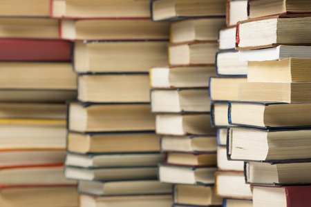 Stack of books background. many books piles.の写真素材