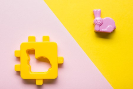 Kids educational developing toys frame on colorful background. Top view. Flat lay. Copy space for textの写真素材