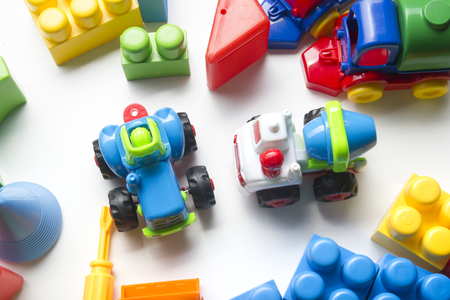 Kids educational developing toys frame on white background. Top view. Flat lay. Copy space for textの写真素材