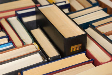 Stack of books background. many books piles.