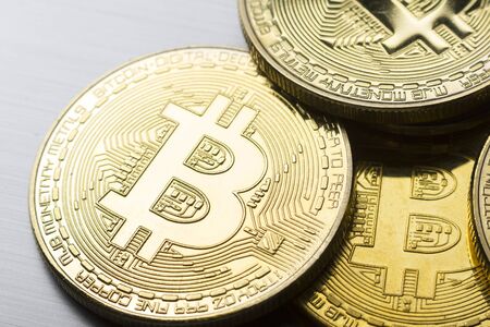 Golden bitcoin with dollar background. conceptual image for crypto currency.