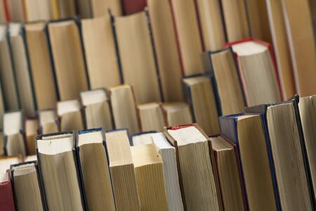 Stack of books background. many books piles.の写真素材